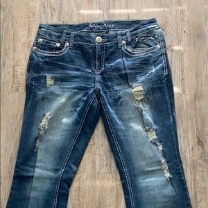 Ariya boot cut distressed jeans